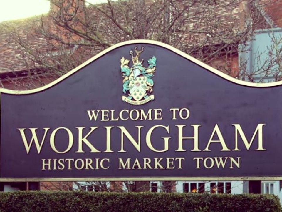 Image displays the Wokingham Town Sign which is situated as you drive into Wokingham